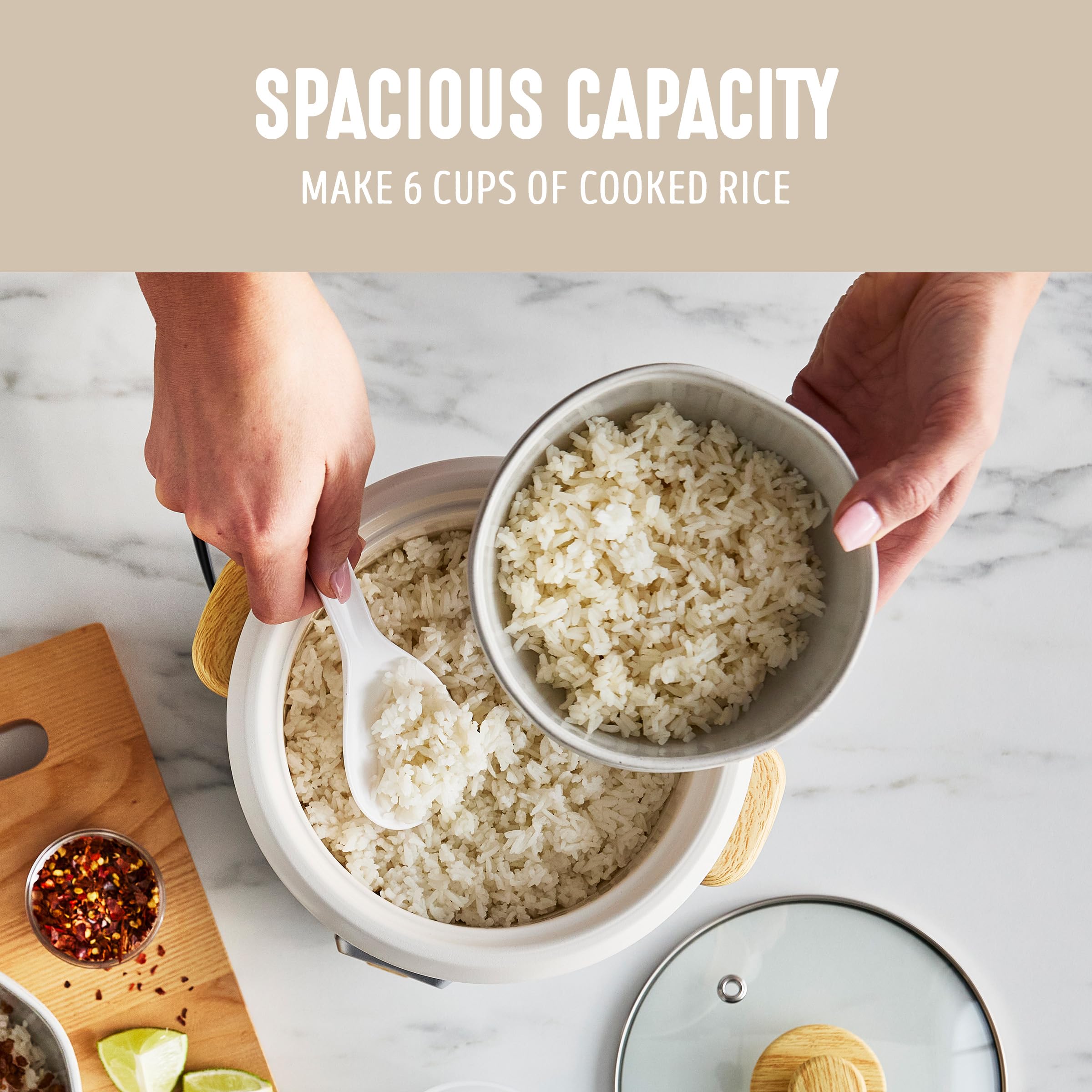 Stay-cool wood-style handle of GreenLife rice cooker for safe transport.