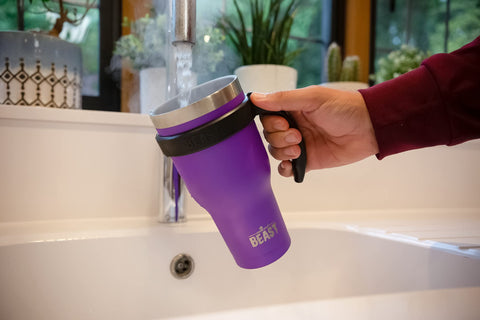 Greens Steel Beast 30 oz tumbler in purple, insulated interior helps maintain temperature.