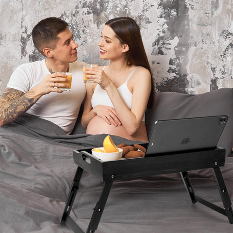 Greenual bed tray table doubles as a laptop desk with a sturdy bamboo surface.