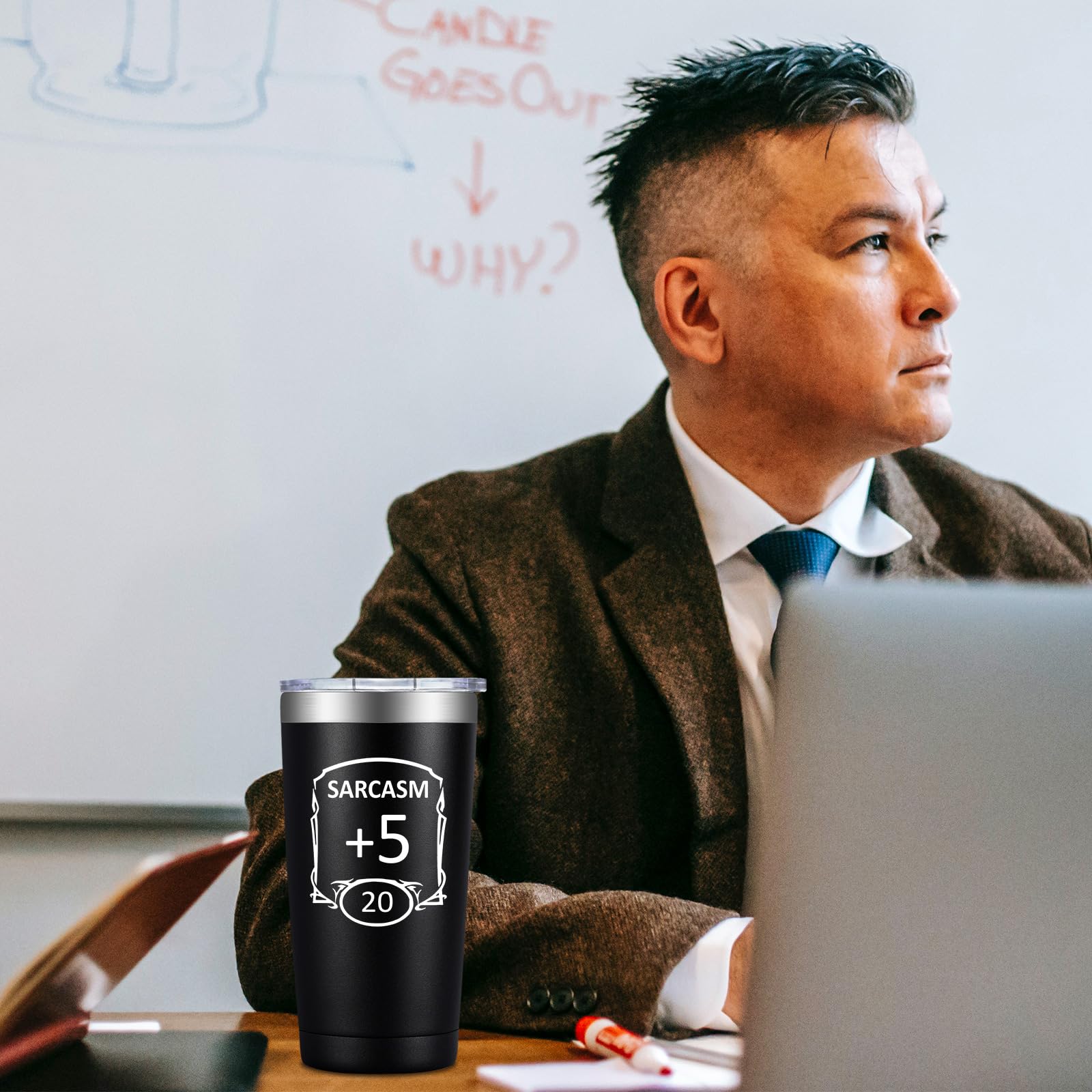 Grifarny Dungeons tumbler held during tabletop session for sipping.