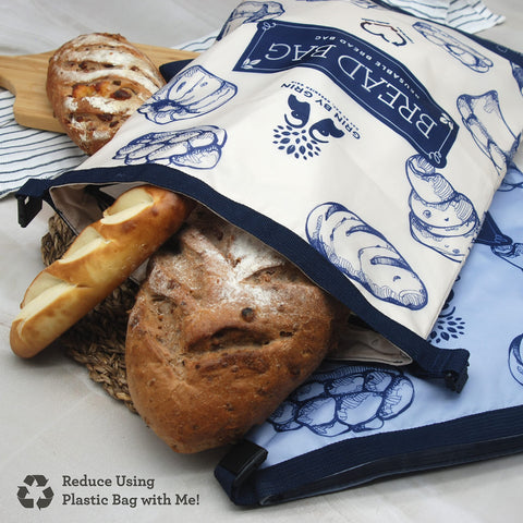 Ivory and blue gray GRIN BY GRIN bread bags for stylish kitchen storage.