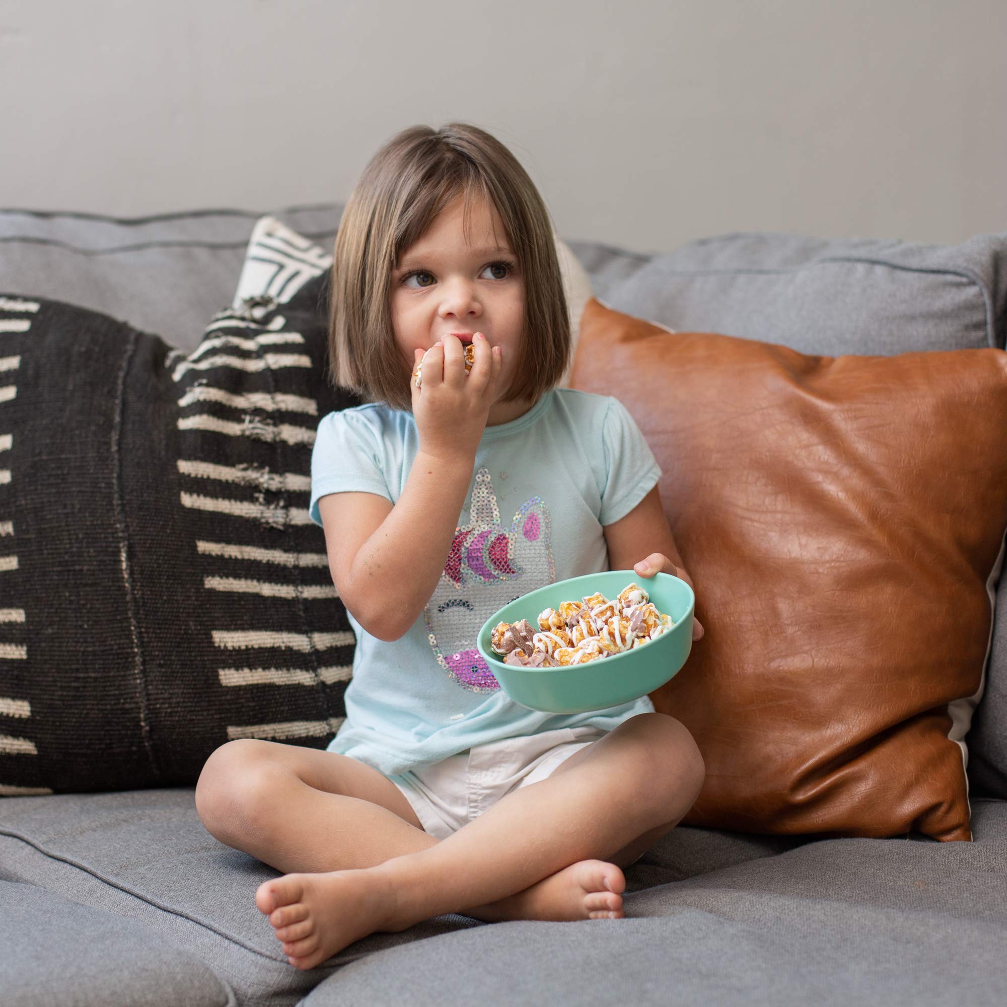 Grow Forward rainforest bowls offer a stable base for tiny hands during meals.