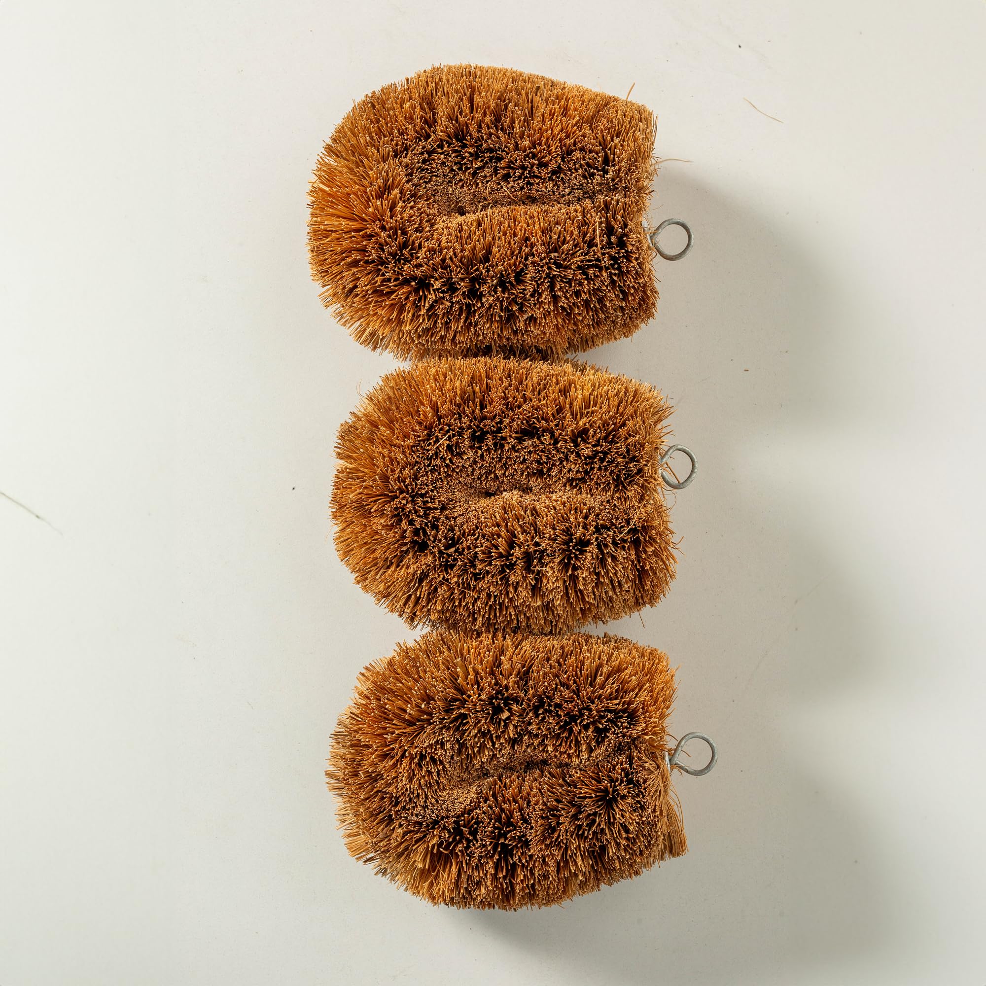 GrowByCoco handcrafted-coir brush highlights artisanal coconut husk craftsmanship.