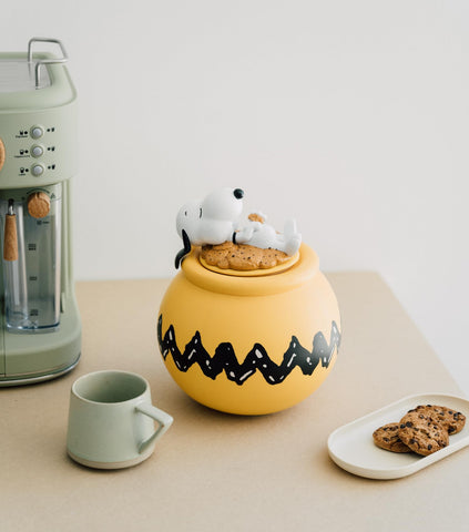 Grupo Erik Snoopy Cookie Jar yellow ceramic adds cheer and practicality.