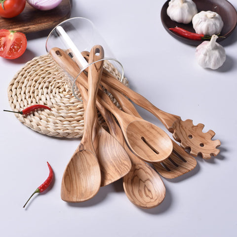 Gudamaye slotted olive wood spoon protects nonstick surfaces while draining liquids
