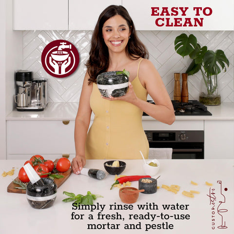 Artisanal-design mortar and pestle add elegant charm to any kitchen.