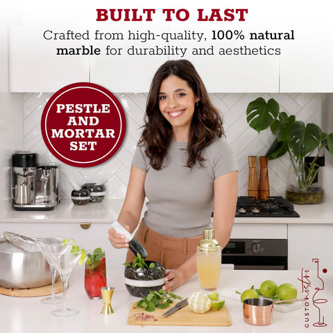 Gusto Nostro pestle in natural marble enhances pesto and salsa textures.
