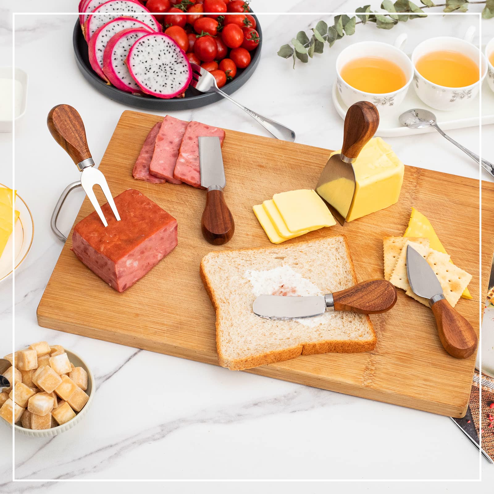 GUZE-US charcuterie forks ready to serve cheese and fruit.