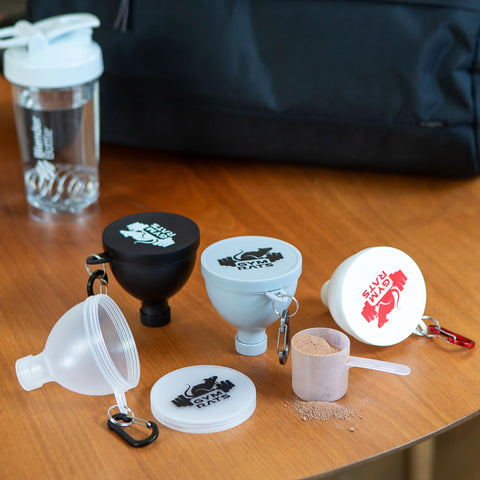 Gym Rats travel bottle funnel in use for quick shakes