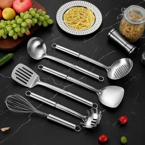Gymdin slotted spoon in stainless steel handy for straining pasta and stirring.