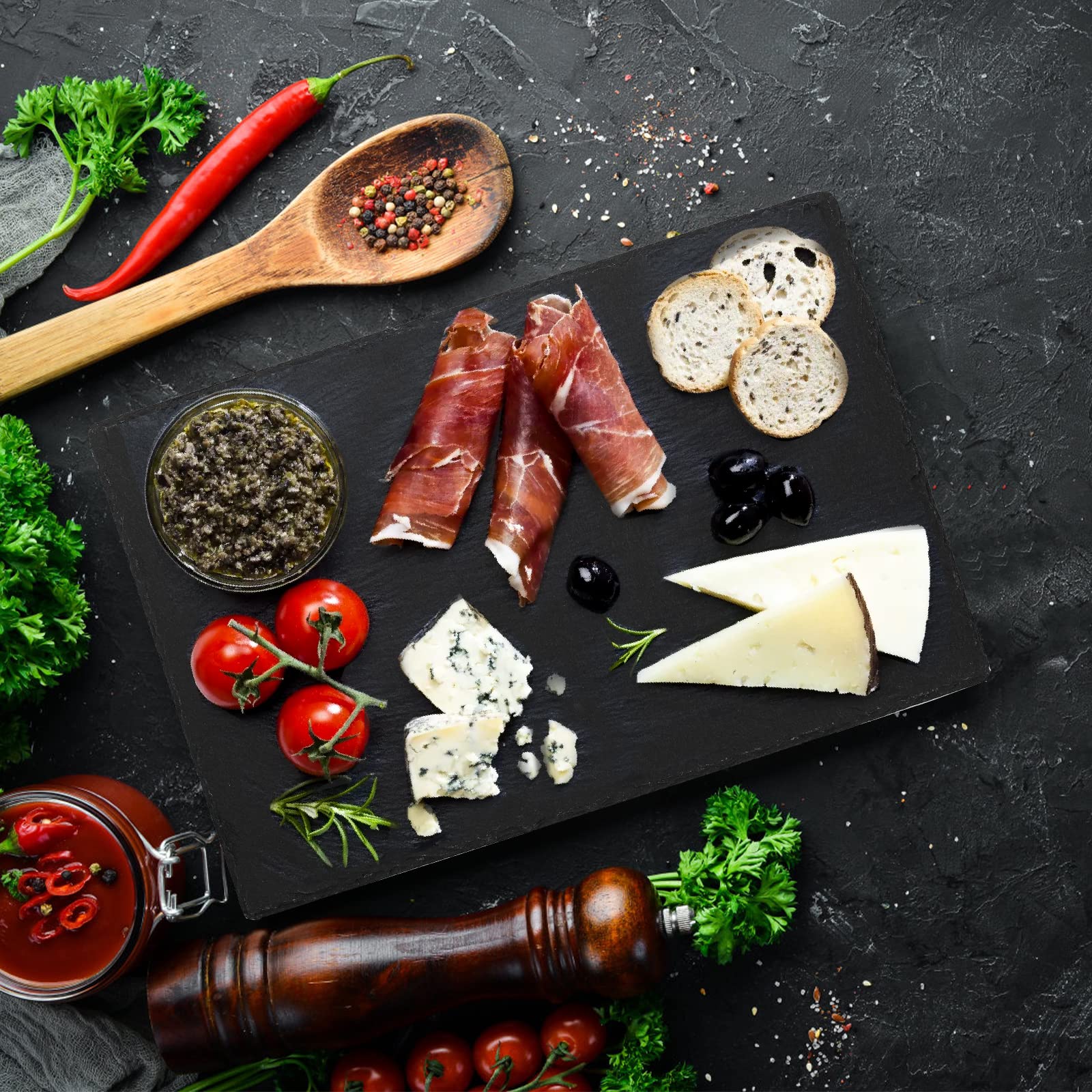 Hacaroa black charcuterie stone plate for gourmet spreads.