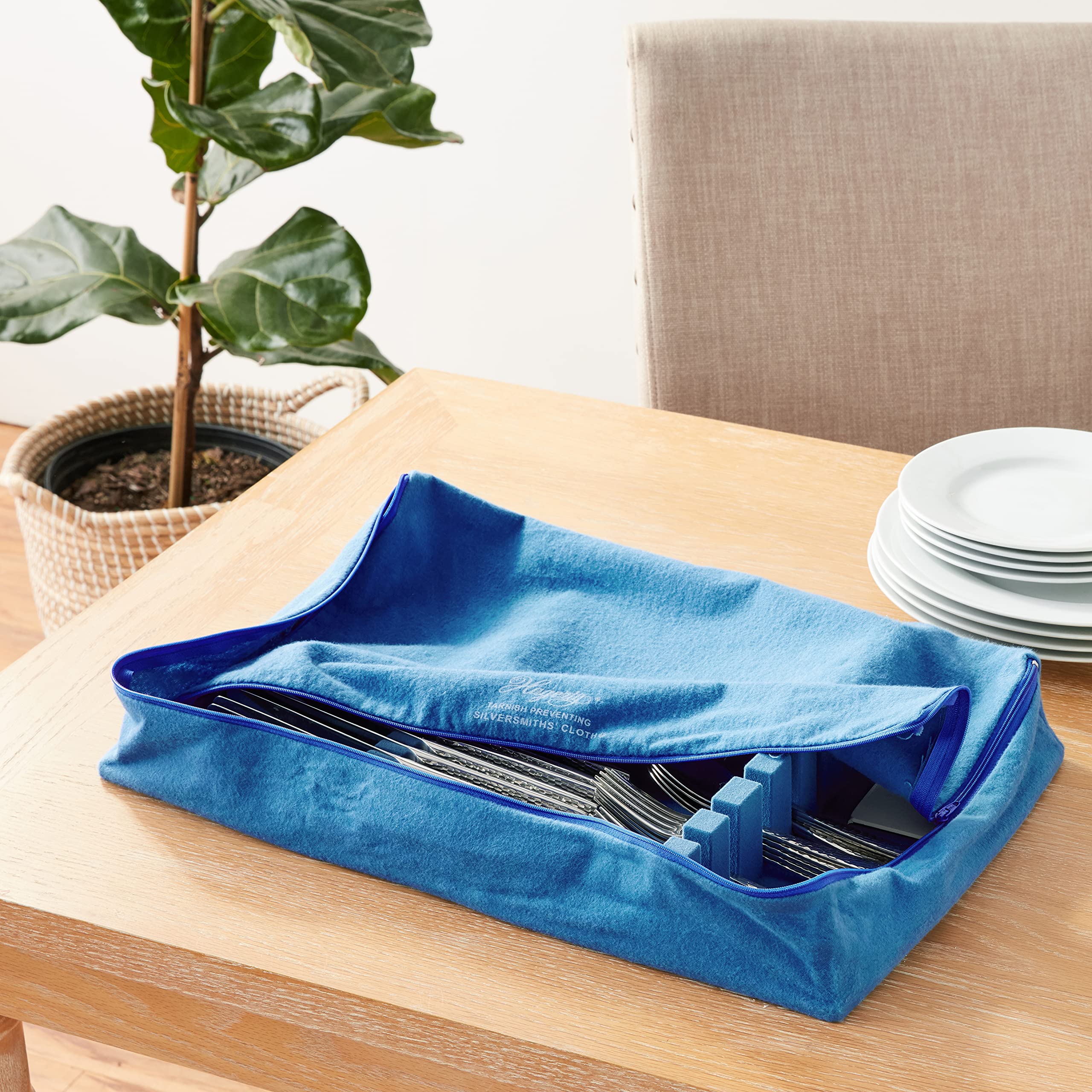 Hagerty Silversmiths' Cloth with R-22 traps tarnish-causing gases to protect silverware.