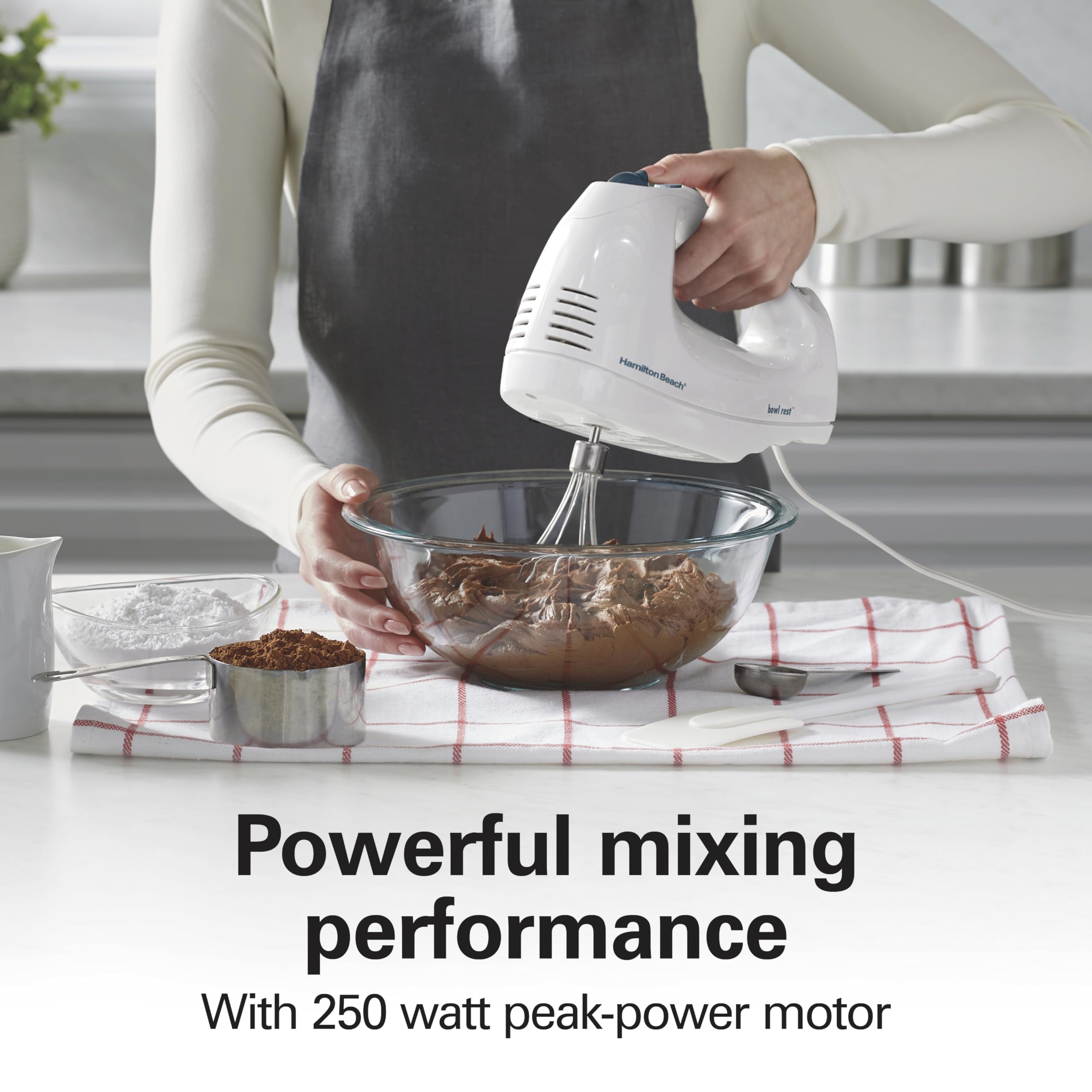 Built-in bowl rest supports the mixer at the bowl edge for mess-free additions.