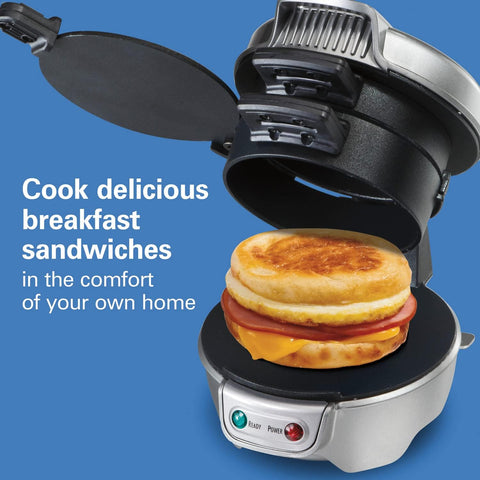 Hamilton Beach sandwich maker with lid closed, toasting top bread while sealing fillings.