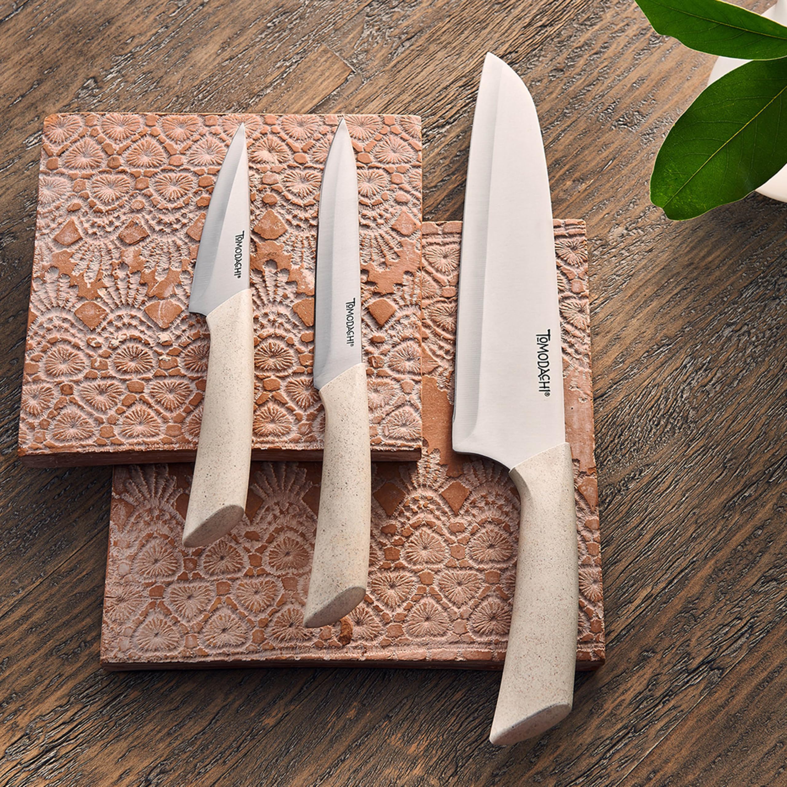 Hampton Forge Harvest 7-inch santoku knife close-up shows versatile chopping control