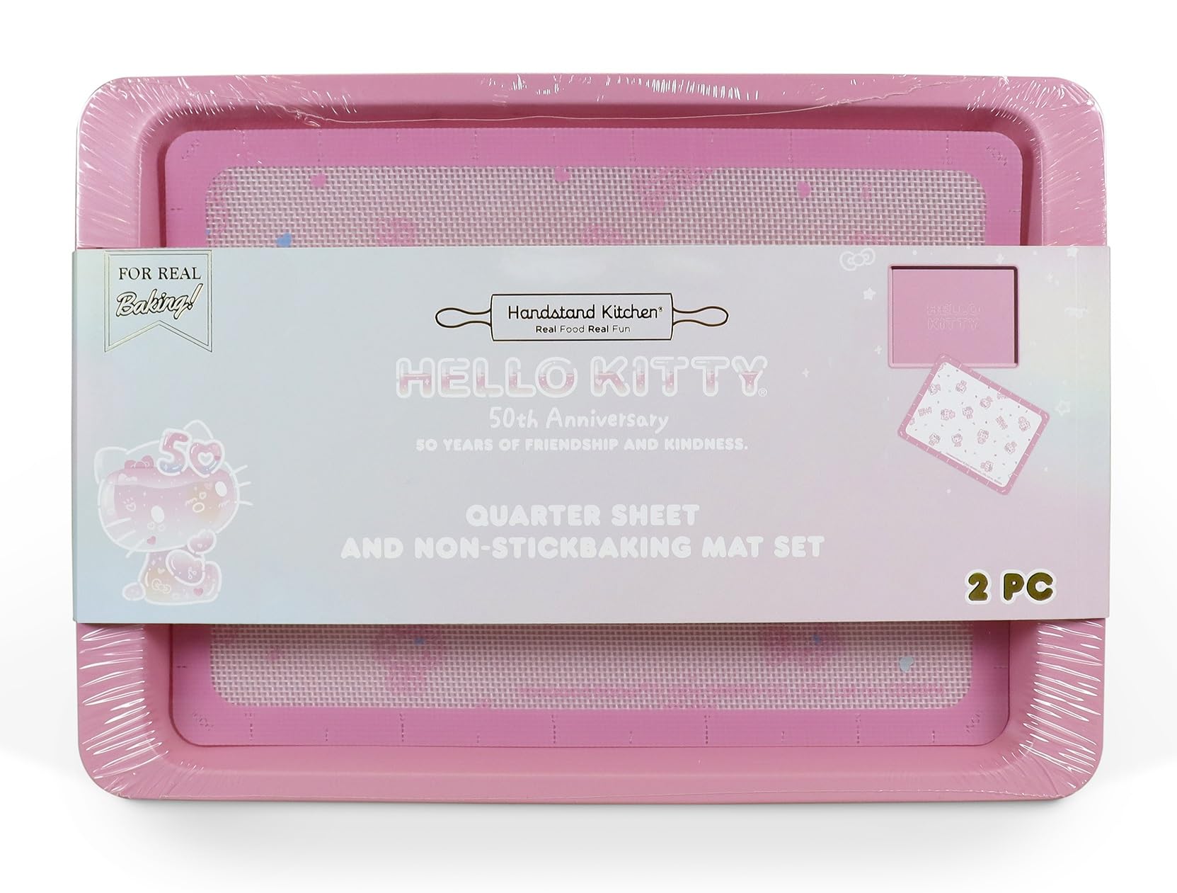 Handstand Kitchen Hello Kitty baking sheet with 50th anniversary pink finish, perfect for cookies.