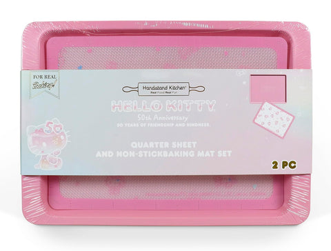 Handstand Kitchen Hello Kitty baking sheet with 50th anniversary pink finish, perfect for cookies.