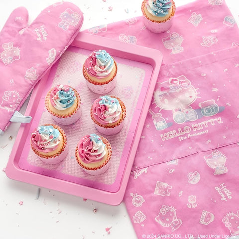 Handstand Kitchen Hello Kitty 50th anniversary oven mitt, matching set with baking tools.
