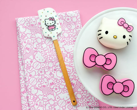 Sanrio licensed Handstand Kitchen branding appears on packaging and tools.
