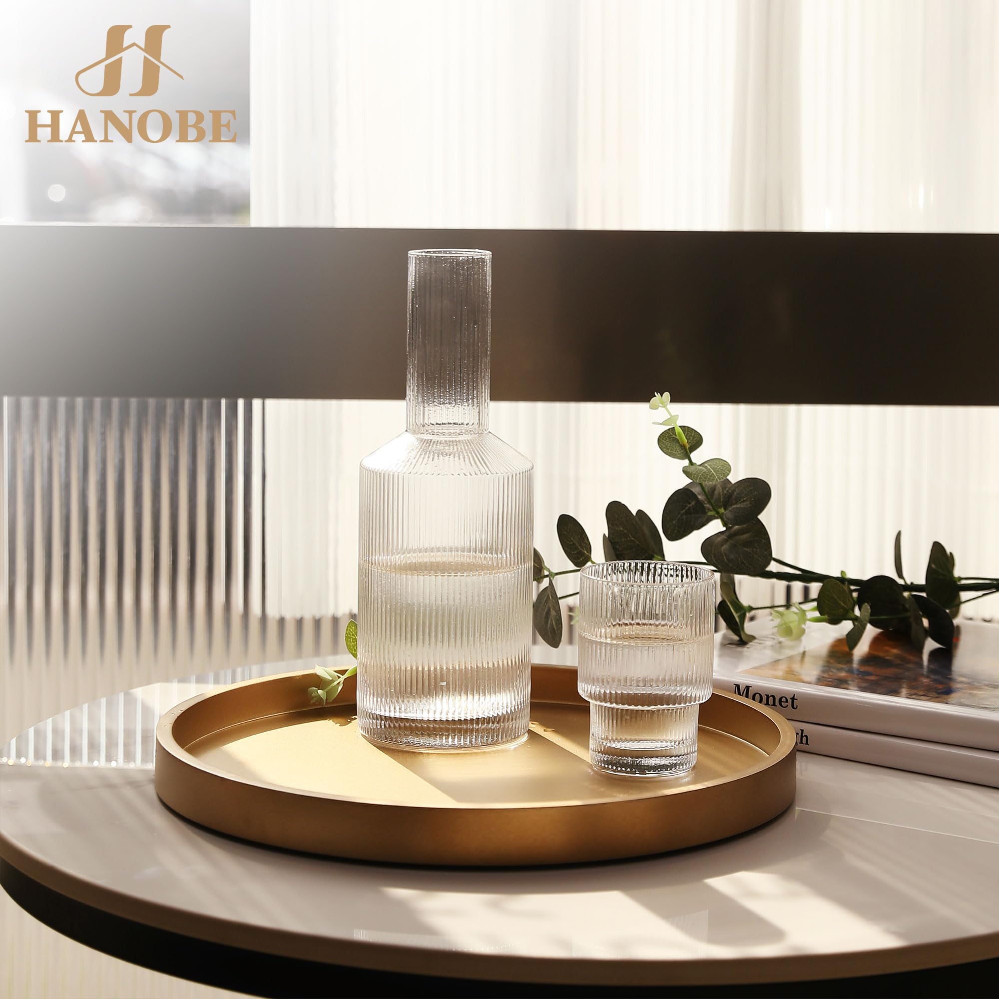 Hanobe candle-holder display tray keeps remotes and small items organized on a coffee table.