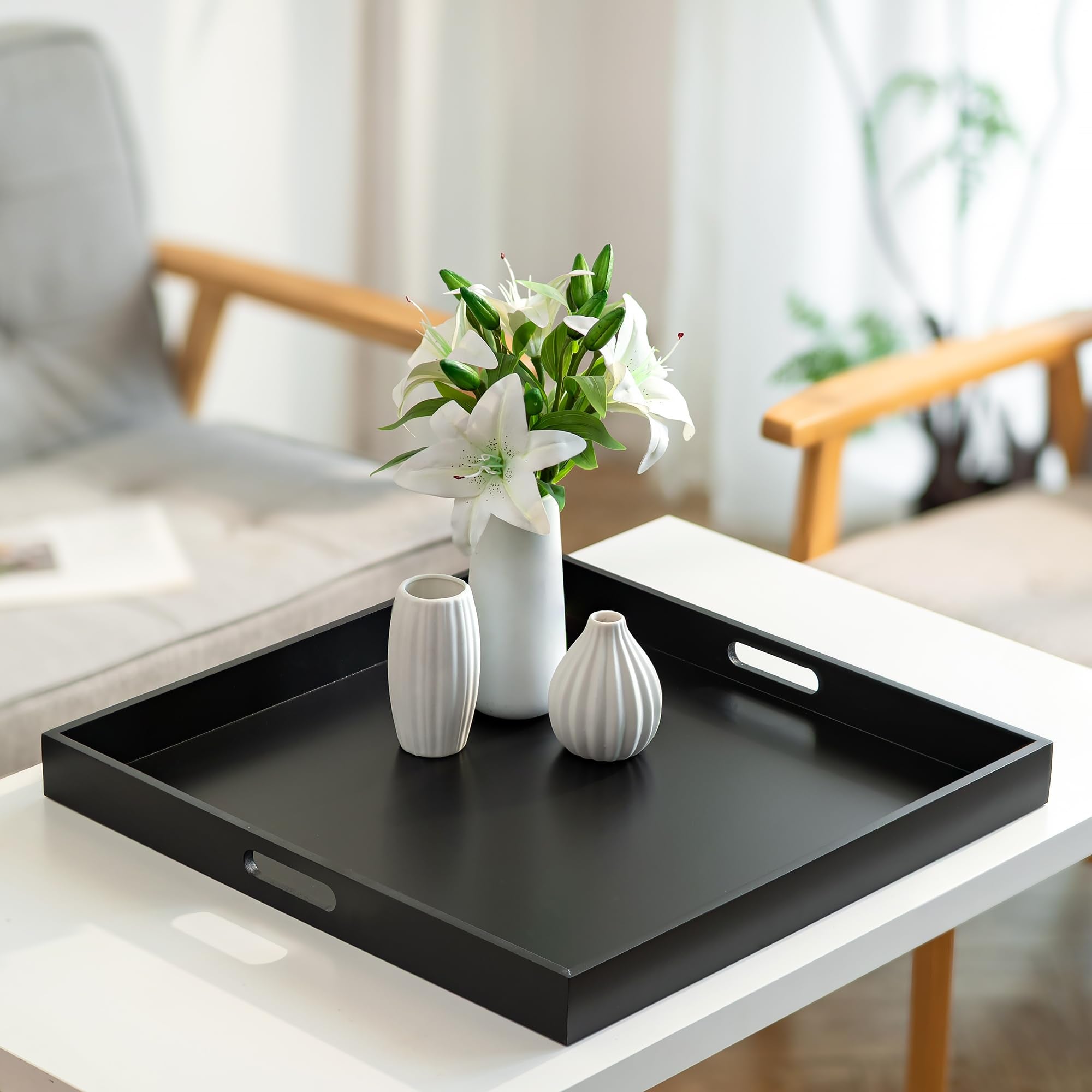 Hanobe charcuterie-style tray on ottoman for party-ready spreads.