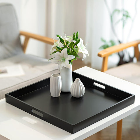 Hanobe charcuterie-style tray on ottoman for party-ready spreads.