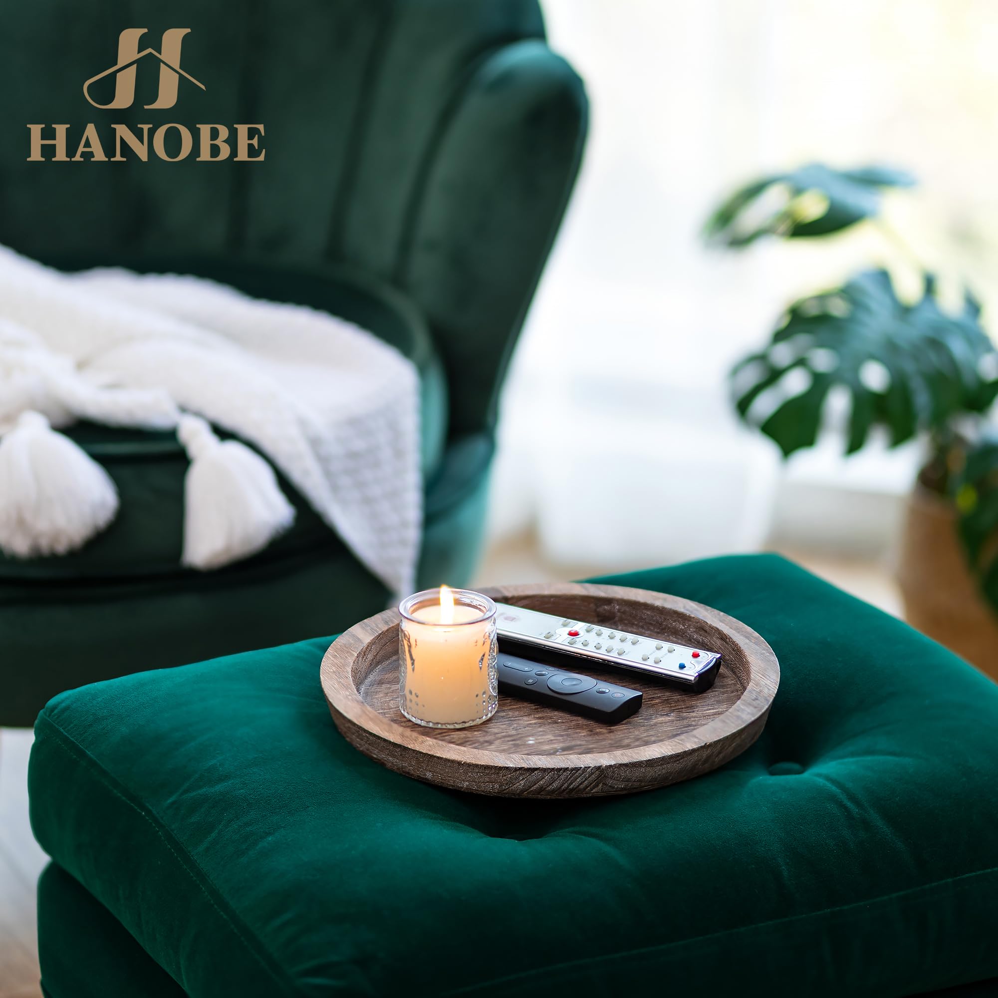 Hanobe tray used as a coffee table centerpiece with candles and accents.