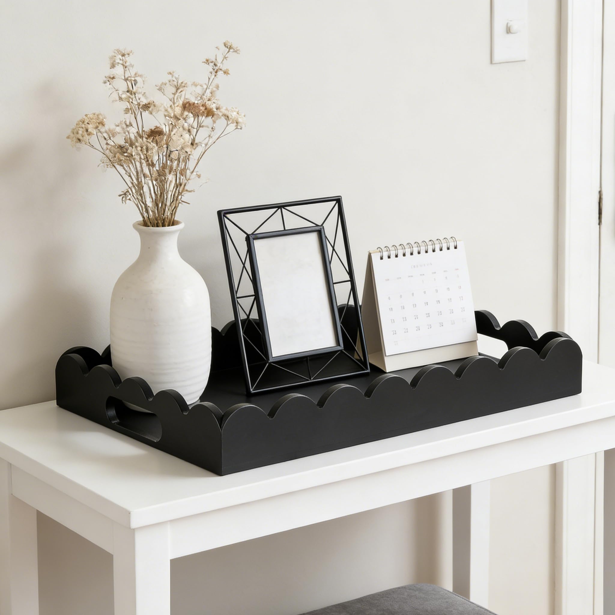 Hanobe decorative tray with scalloped edge on a coffee table, perfect for organizing items.