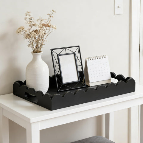 Hanobe decorative tray with scalloped edge on a coffee table, perfect for organizing items.