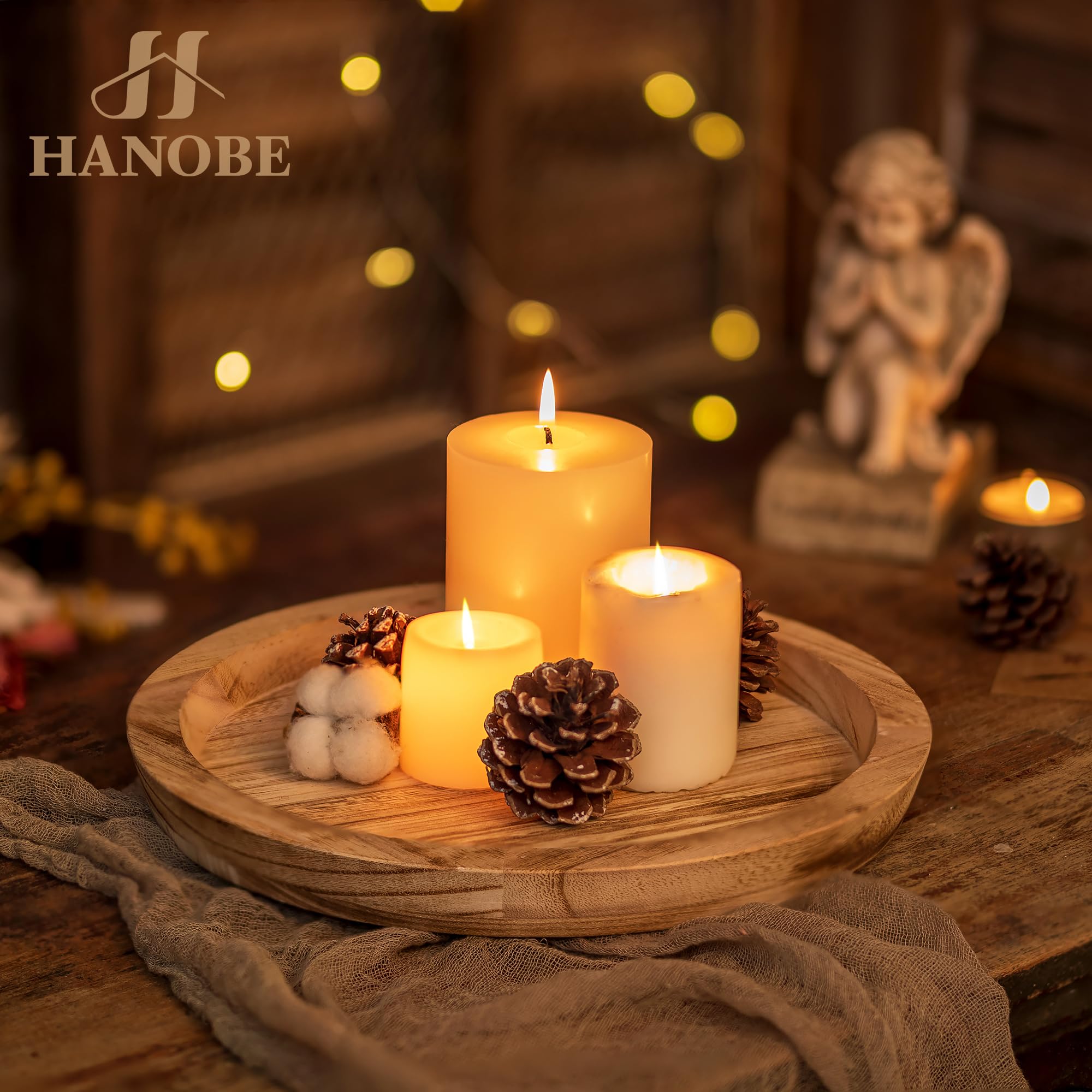 Hanobe round candle holder plate displaying candles for warm table ambiance.