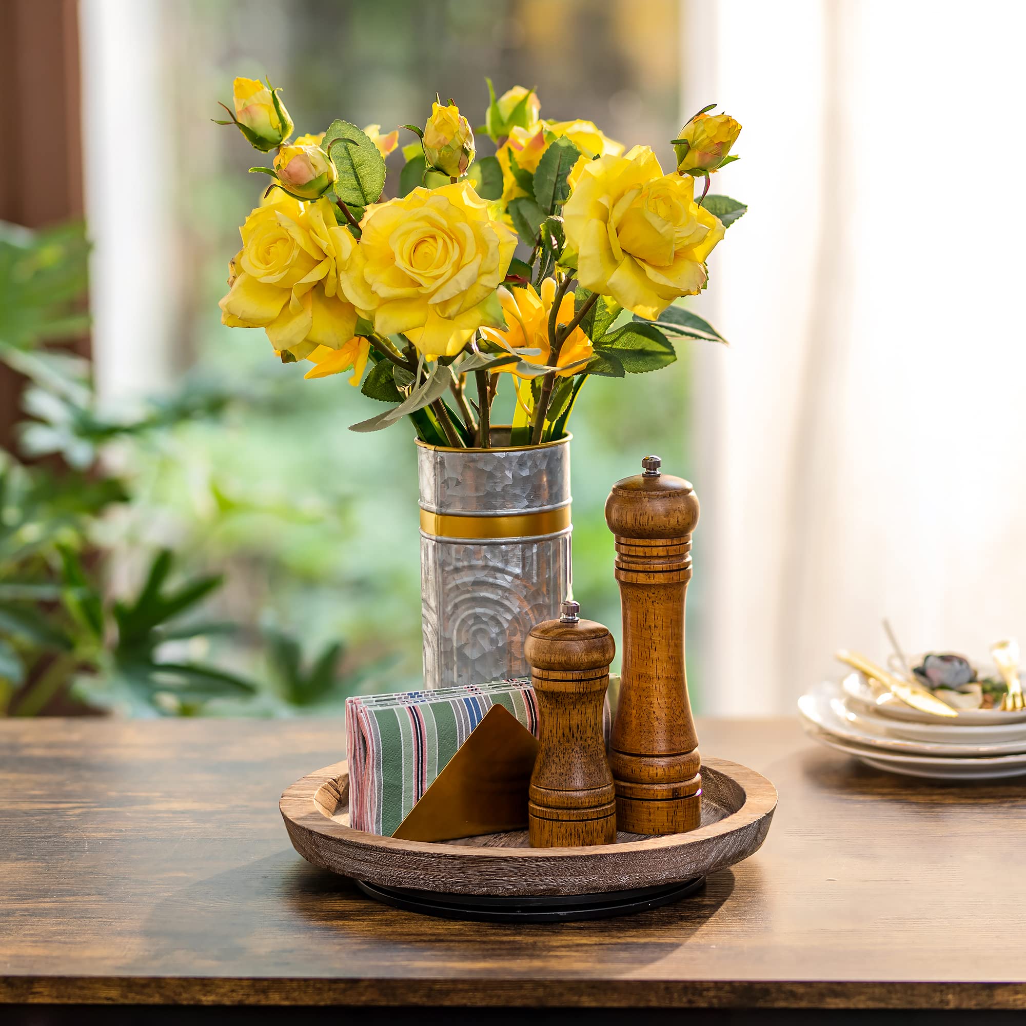 Hanobe round paulownia wood centerpiece on a dining table