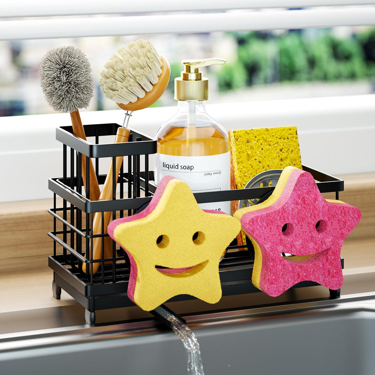 HapiRm sink caddy with smiley-face holders on a sleek black stainless steel body.