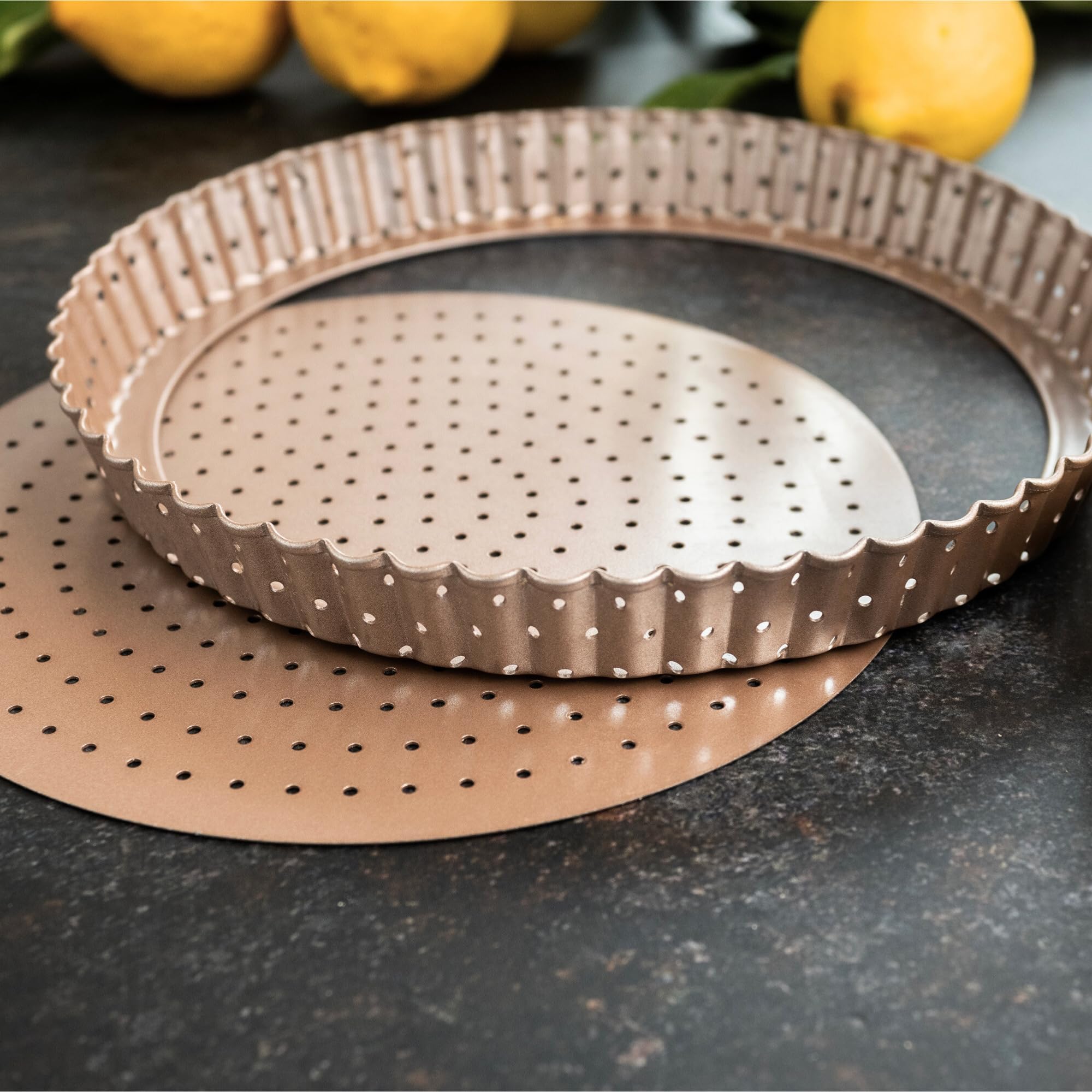 HAPPIELS champagne-gold tart pan makes a stylish gift for bakers
