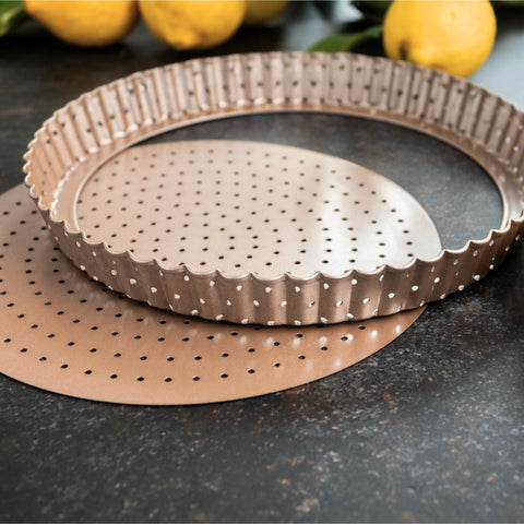 HAPPIELS champagne-gold tart pan makes a stylish gift for bakers