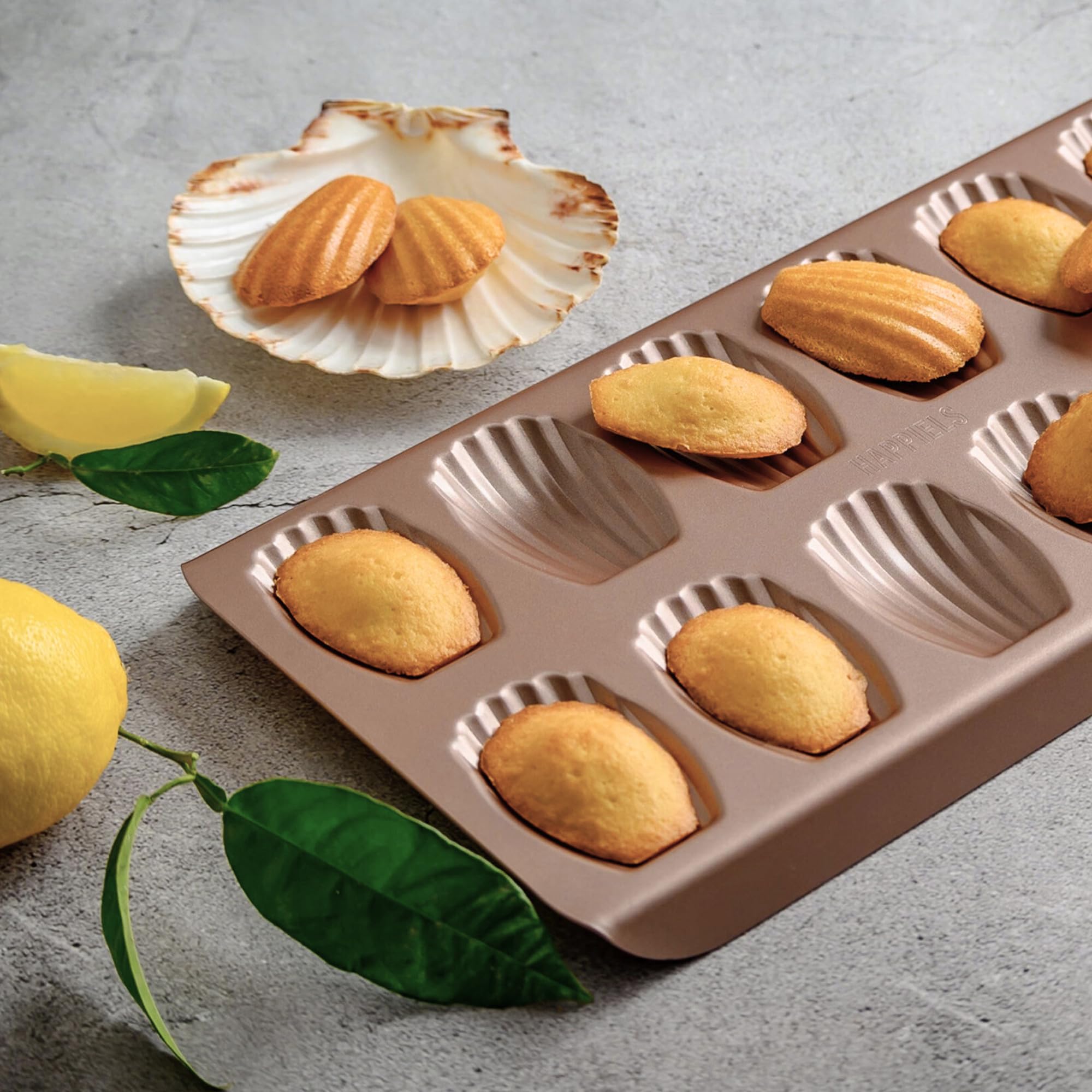 HAPPIELS nonstick Madeleine tray with 24 wells for large bake runs.