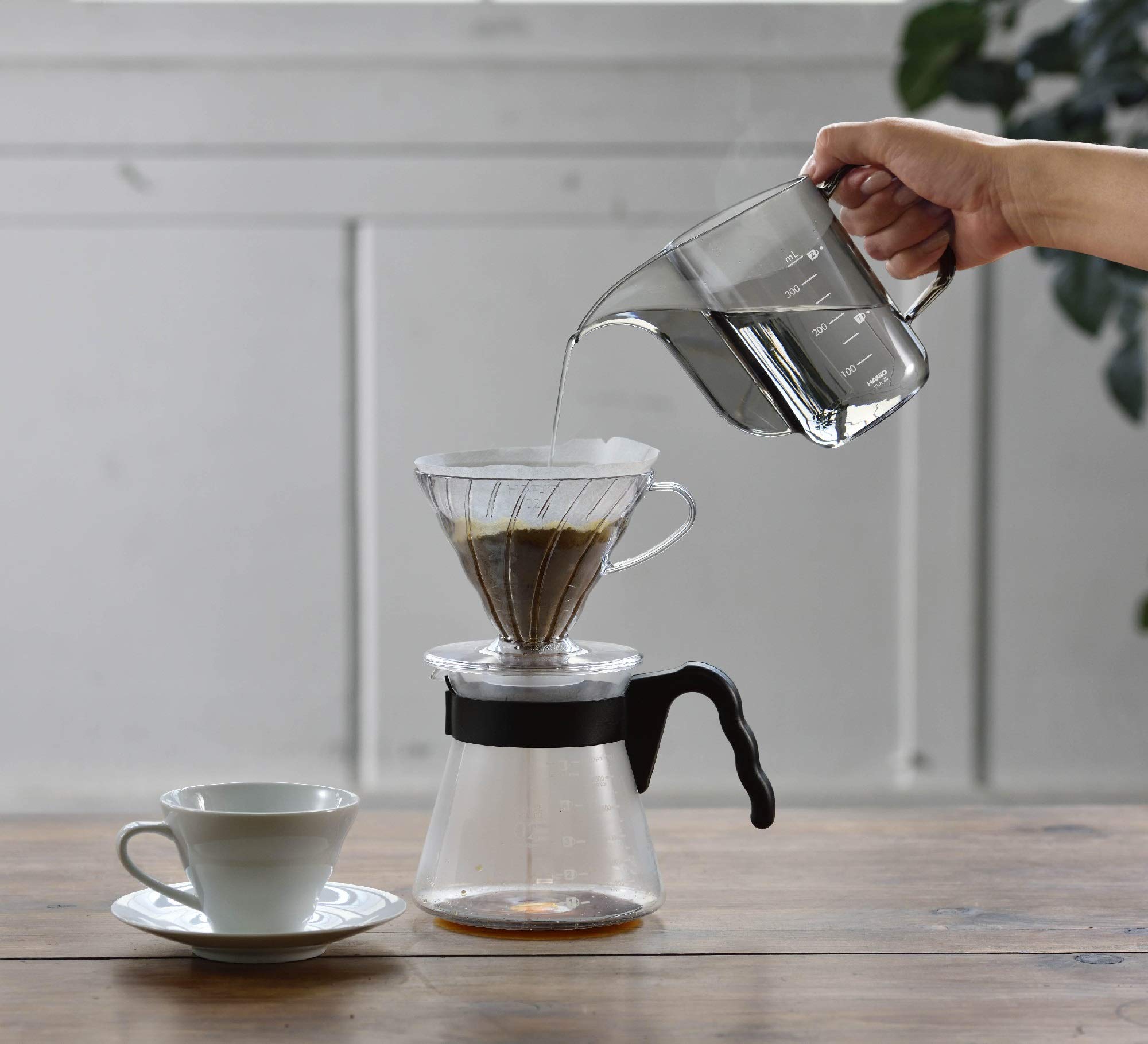 Hario Air Kettle transparent resin body reveals water movement during pour.