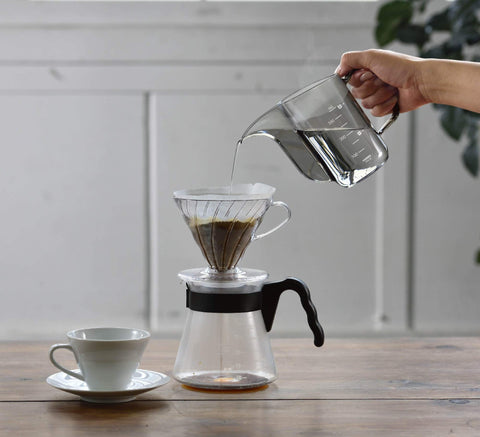 Hario Air Kettle transparent resin body reveals water movement during pour.