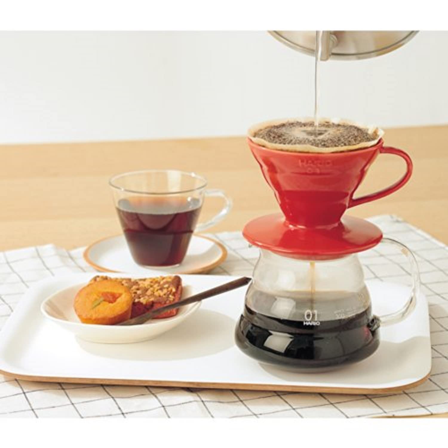 Glossy red glaze on ceramic surface of the Hario V60 dripper