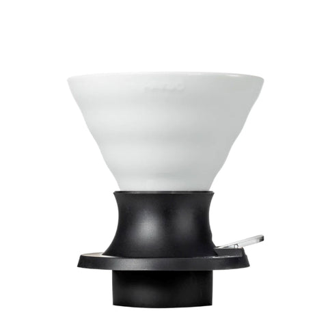 Hario Switch white with filters pack demonstrates ready-to-brew setup for home coffee rituals.