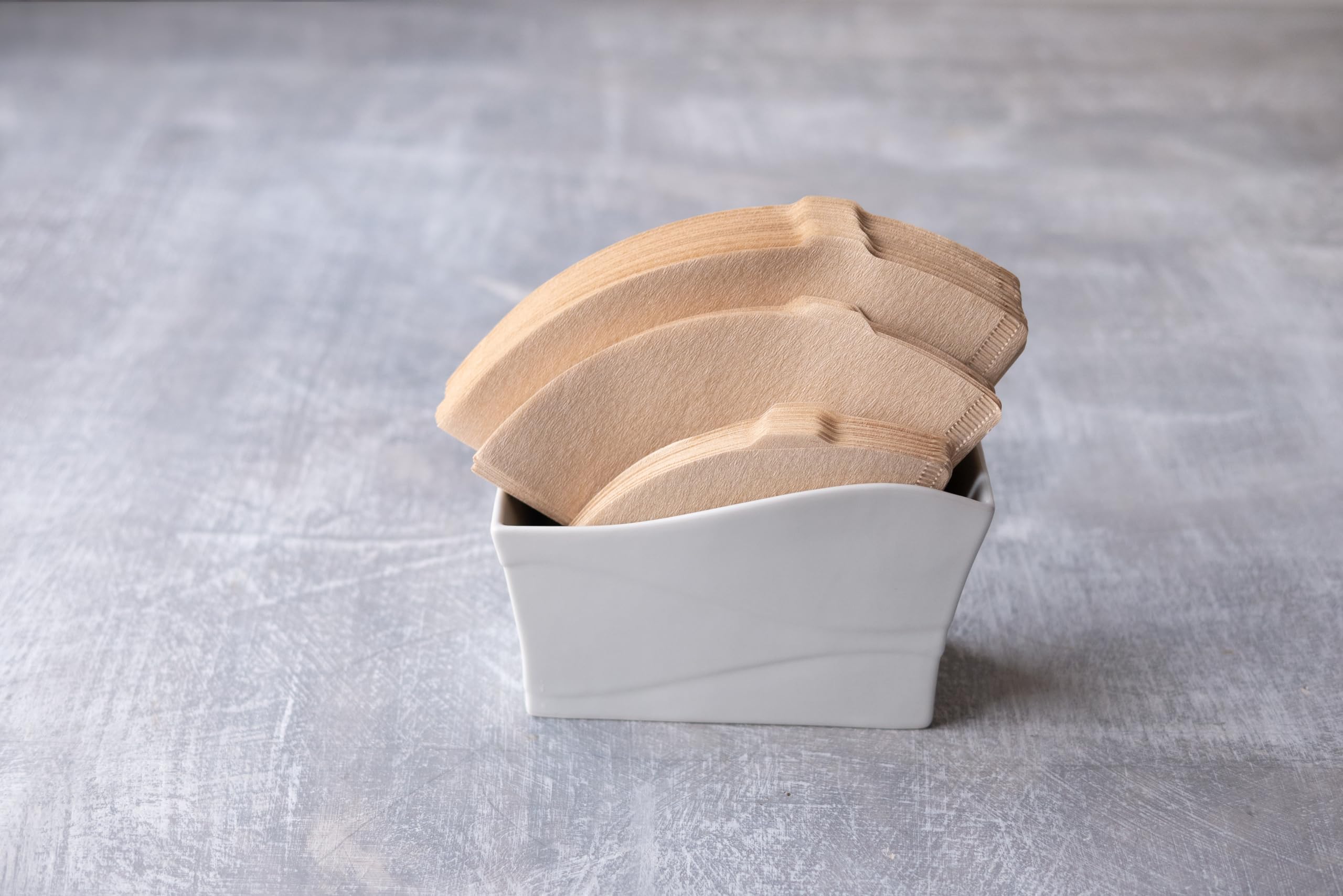 Hario V60 filter sheets close-up, natural color for consistent cone brewing