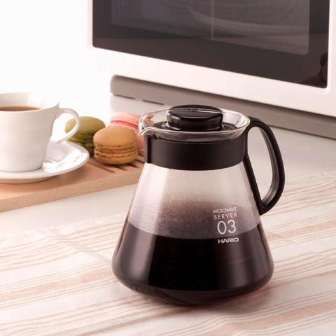 Heatproof handle offers comfortable, controllable pouring