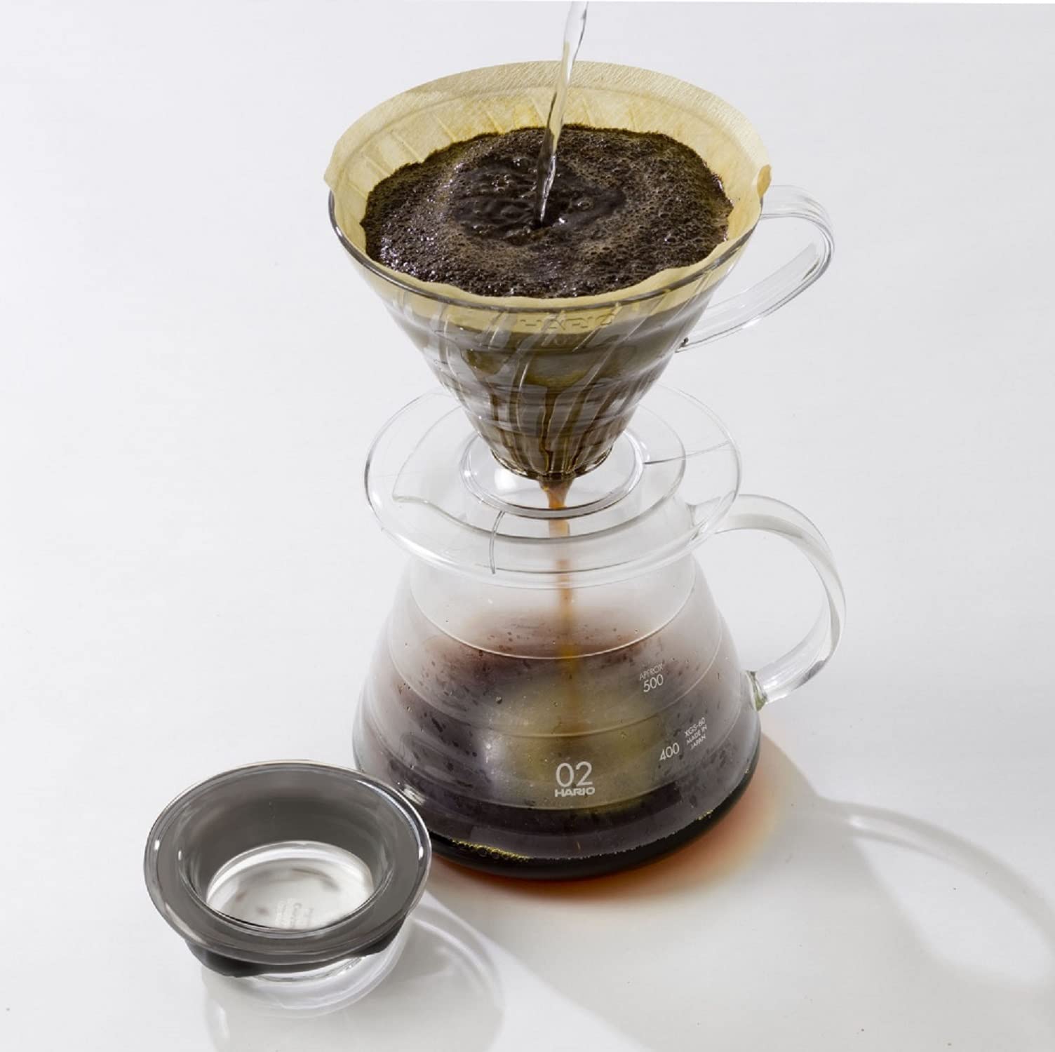 Hario V60 plastic dripper with filter ready for brew prep in busy mornings