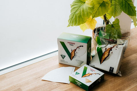 Hario V60 Size 02 cone filter in unbleached natural paper.