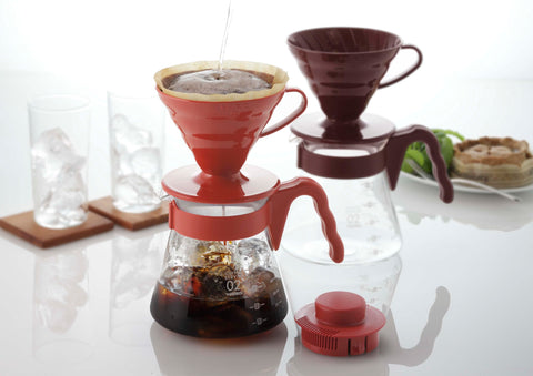 Hario V60 filters with kit, promotes clean, balanced flavor.