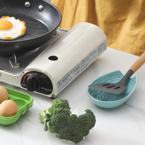 HASENSE modern kitchen decor spoon rest complements teal countertops.