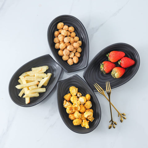 Hasense spoon rest on countertop helps organize utensils and prevent drips.