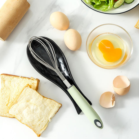 Hasense spoon rest on stove top; easy to clean and dishwasher safe.
