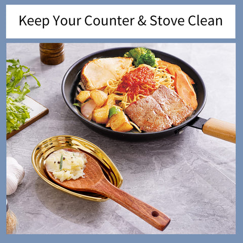 Gold-toned Hasense spoon rest complements gold flatware and modern kitchen décor