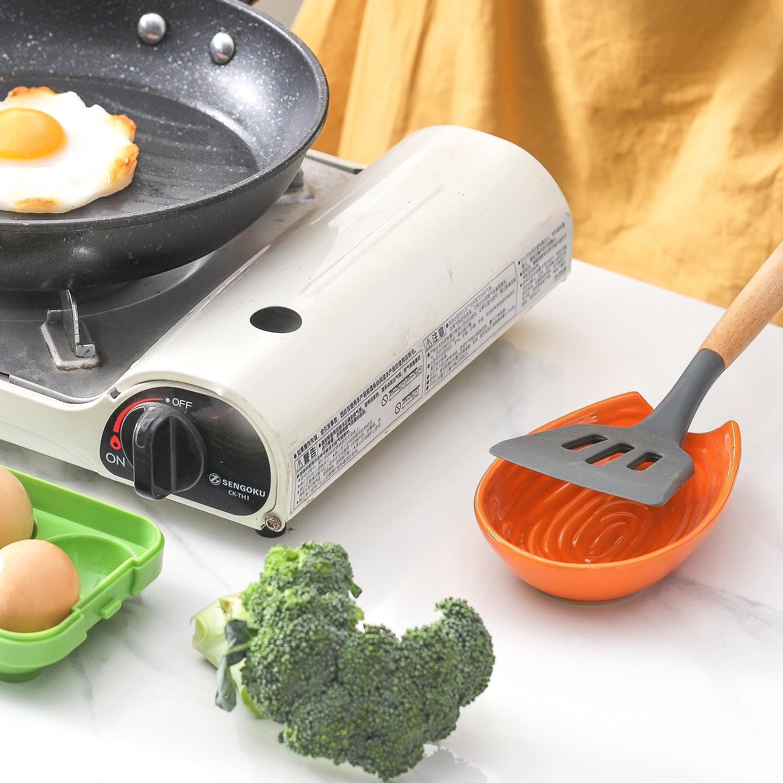 HASENSE orange spoon rest makes a thoughtful gift for cooking enthusiasts