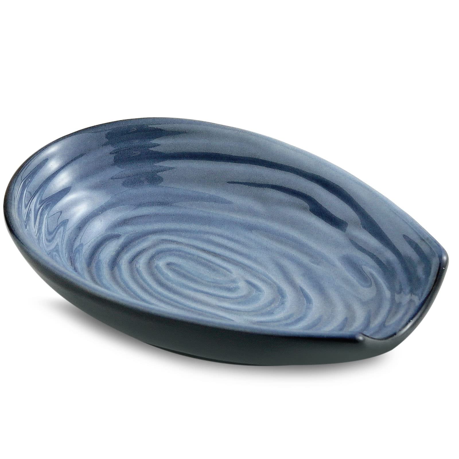Hasense spoon rest on stove-top keeps utensils organized and clean.